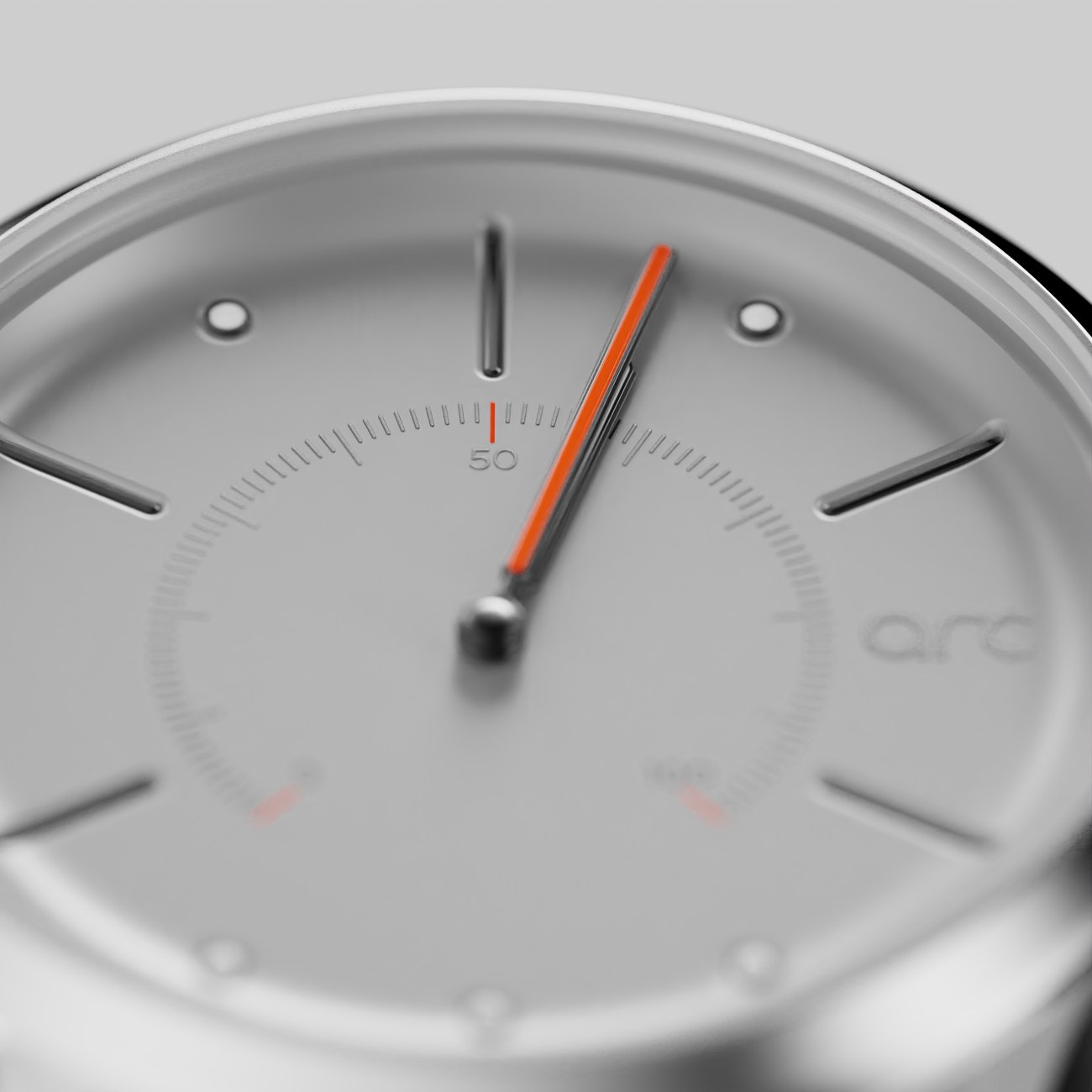 Macro detail of a Globics hybrid watch dial showing the orange seconds hand, applied indices and brushed metal finish